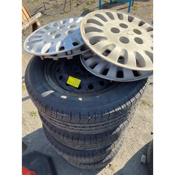 4 RIMS W/HUBCAPS - 2 RIMS W/TIRES