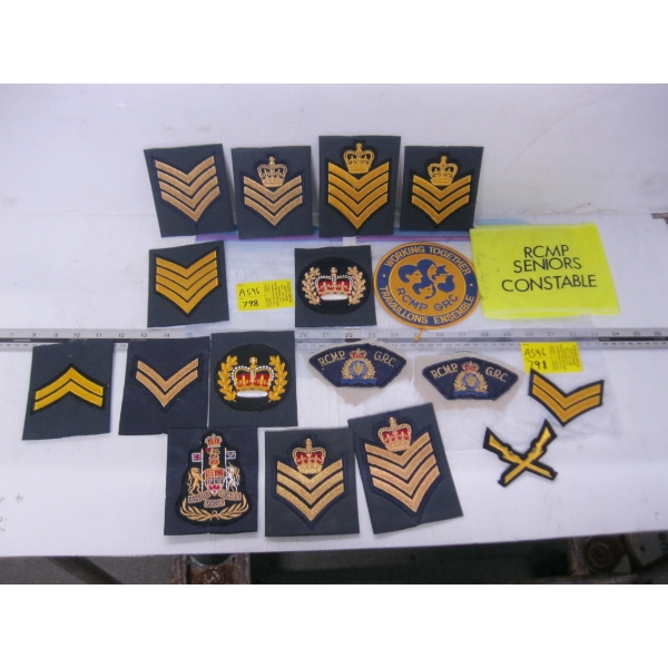 ASSORTMENT OF RCMP BADGES & ARM BANDS