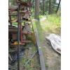 Image 1 : MISC. FLAT BAR SHEET, 4X4 SQUARE TUBING, ETC. ON SIDE OF RACK