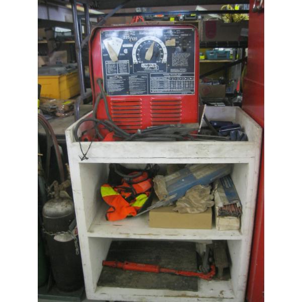 LINCOLN ELECTRIC WELDER ON ROLLING STAND W/ACCESS.
