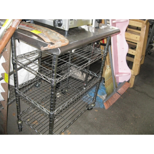 STAINLESS STEEL TOP ADJUSTABLE SHELF UNIT ON CASTORS
