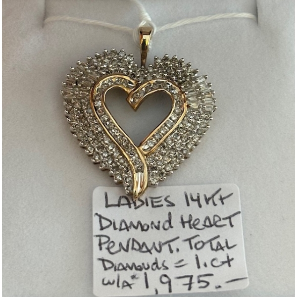 LADIES 14KT DIAMOND HEART PENDANT.  TOTAL DIAMONDS = 1. CT W/A $1,975.