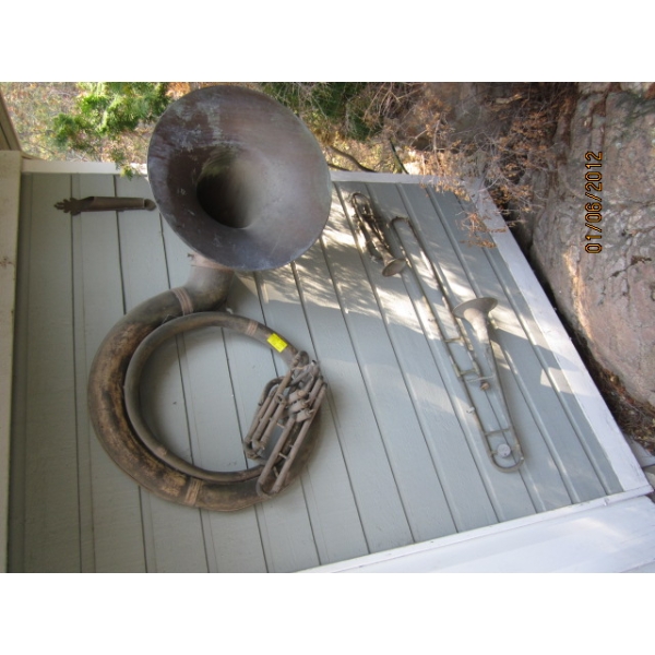 TUBA, TROMBONE & TRUMPET MOUNTED ON SIDE OF HOUSE