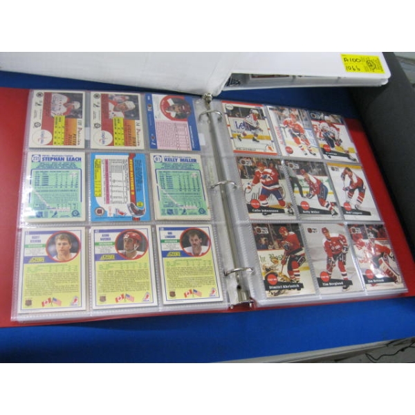 WHITE & RED BINDER OF COLLECTOR CARDS