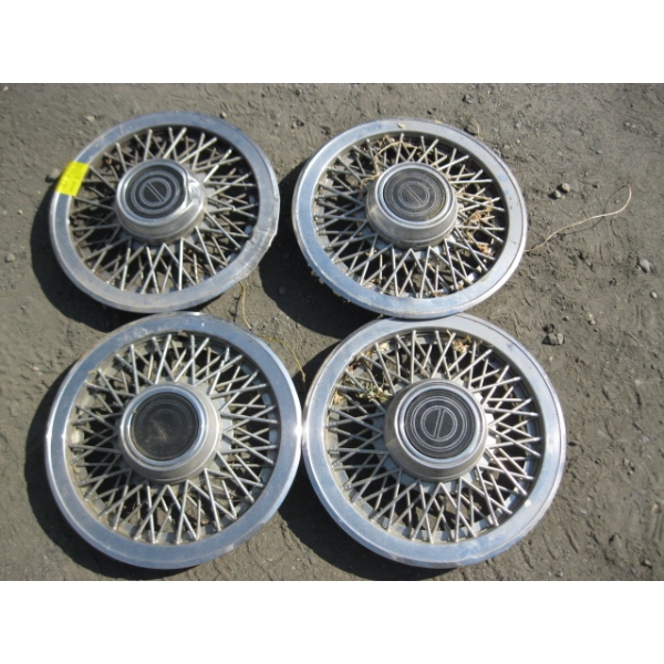 SET OF 4 WIRE SPOKE HUBCAPS - SOME DAMAGE