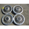 Image 1 : SET OF 4 WIRE SPOKE HUBCAPS - SOME DAMAGE