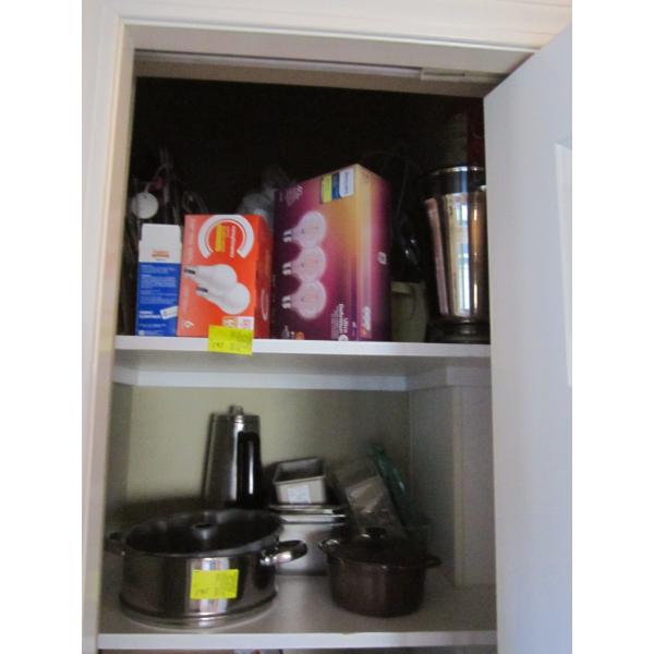 CUPBOARD W/MISC. ICE BUCKETS, LIGHTS, BAGS, CAKE PANS, LA CREUSET POT, ETC.