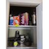 Image 1 : CUPBOARD W/MISC. ICE BUCKETS, LIGHTS, BAGS, CAKE PANS, LA CREUSET POT, ETC.