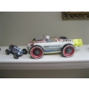 Image 1 : 2 TIN CARS - 1 VINTAGE WIND UP, 1 BATTERY OPERATED