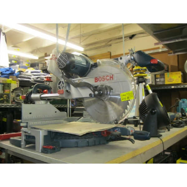 BOSCH SLIDING COMPOUND MITER SAW W/EXTRA BLADE