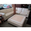 Image 1 : WHITE LEATHER SECTIONAL SOFA & LG. CENTER OTTOMAN/COFFEE TABLE