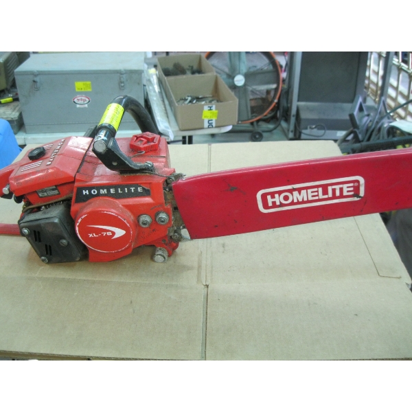 HOMELITE EXCEL 75 CHAINSAW W/BAG OF ACCESS.