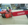 Image 1 : HOMELITE EXCEL 75 CHAINSAW W/BAG OF ACCESS.