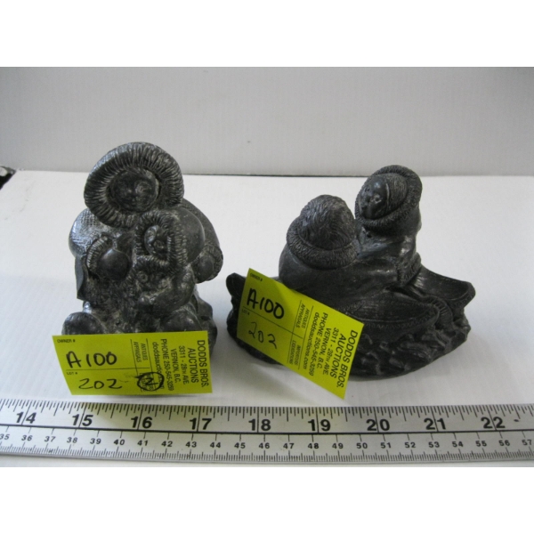 2 WOLF SCULPTURED INUIT FIGURINES