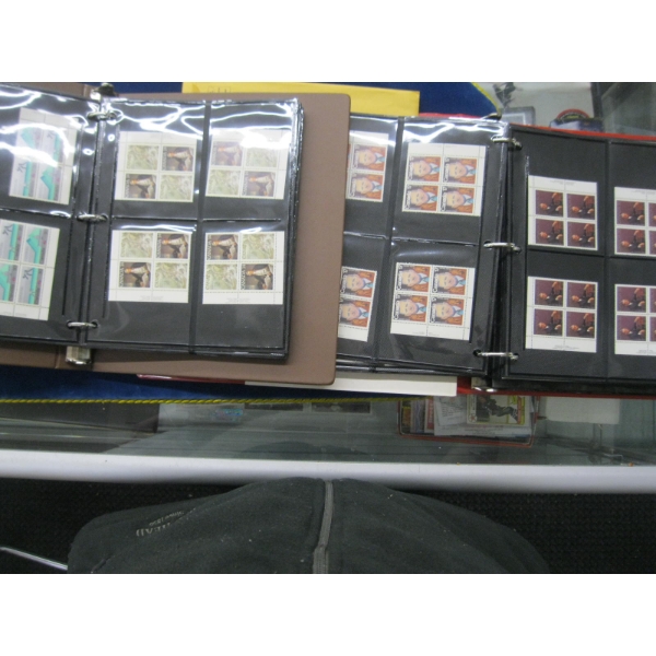 2 BINDERS OF STAMPS