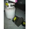 Image 1 : OUTDATED SM. PROPANE TANK W/PROPANE & PAIR OF SM. WHEEL CHOCKS