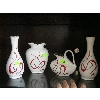 Image 1 : 4 PIECE SET OF GERMAN POTTERY VASES
