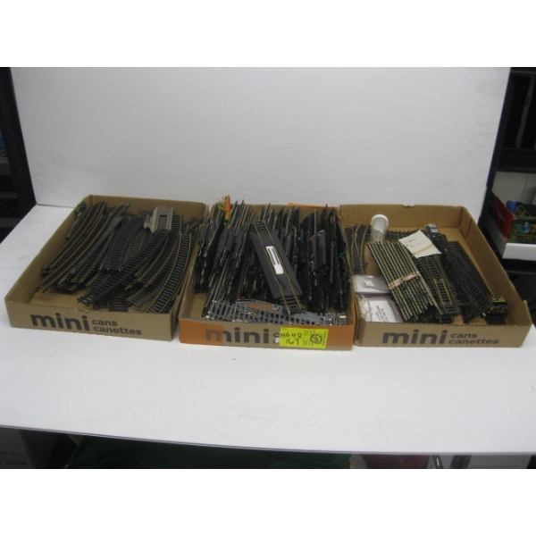 3 BOXES OF HO TRACK, SWITCHES, ETC.