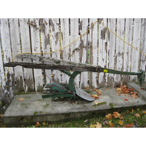 PLOW & A FORD TRACTOR DRIVE WHEEL