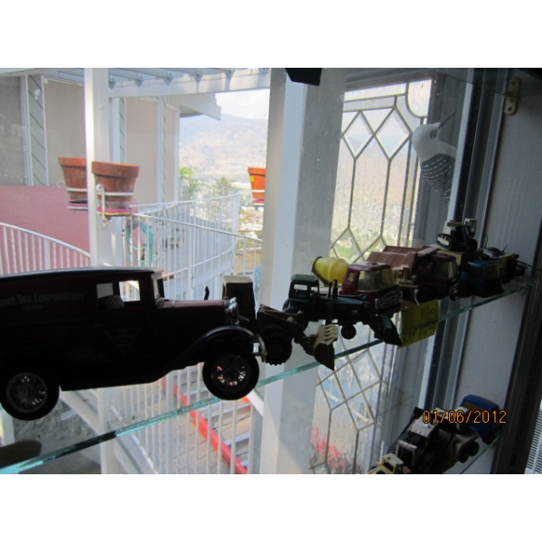 SHELF W/MISC. - SM. TRACTORS, TRUCK, ETC.