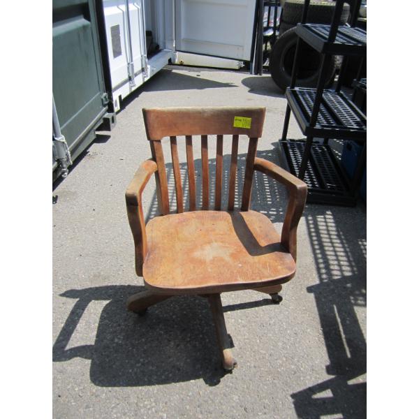 ANTIQUE WOODEN ROLLING ARMCHAIR