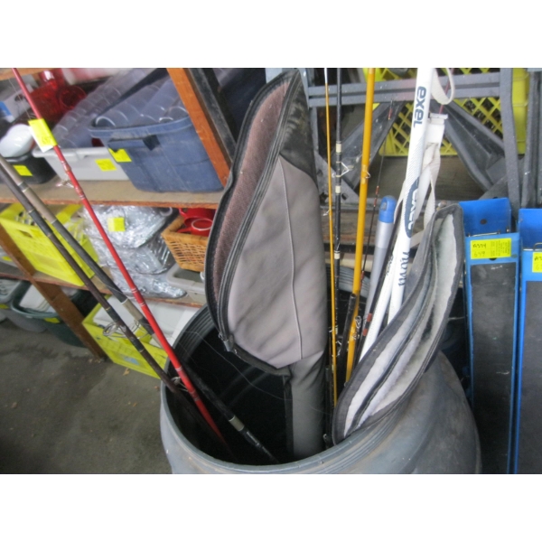 BARRELL CONTENTS: FISHING RODS, CROSS COUNTRY SKI POLES, ETC.