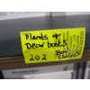 Image 2 : ARTIFICIAL PLANTS & DÉCOR BOOKS ON BOTH SHELVES