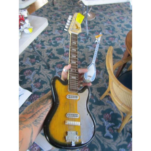 TIN ELECTRIC GUITAR & A MINI MANDOLIN