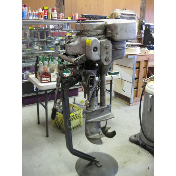 VINTAGE EVINRUDE ENGINE ON STAND - YEAR 1935