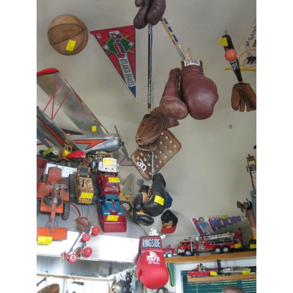 VINTAGE SPORTS EQUIPMENT - SKATES, STICKS, BASKETBALL GLOVES, ETC.