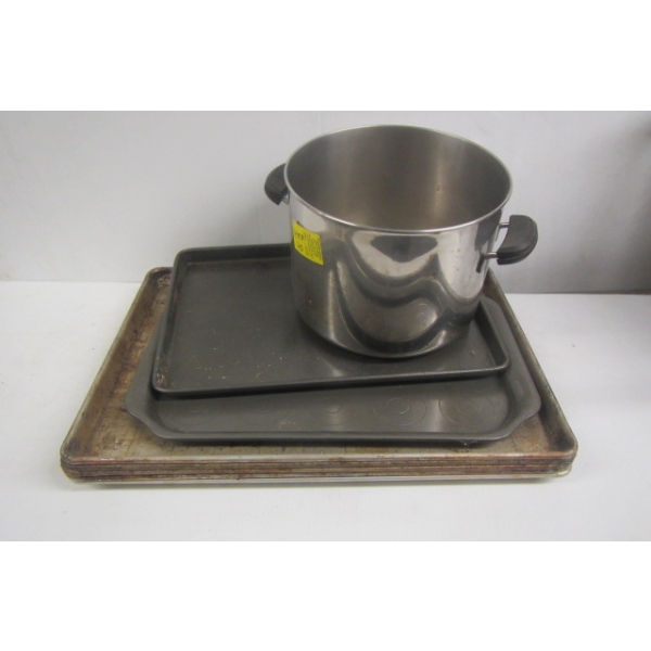 STACK OF FLAT PANS & A LG POT