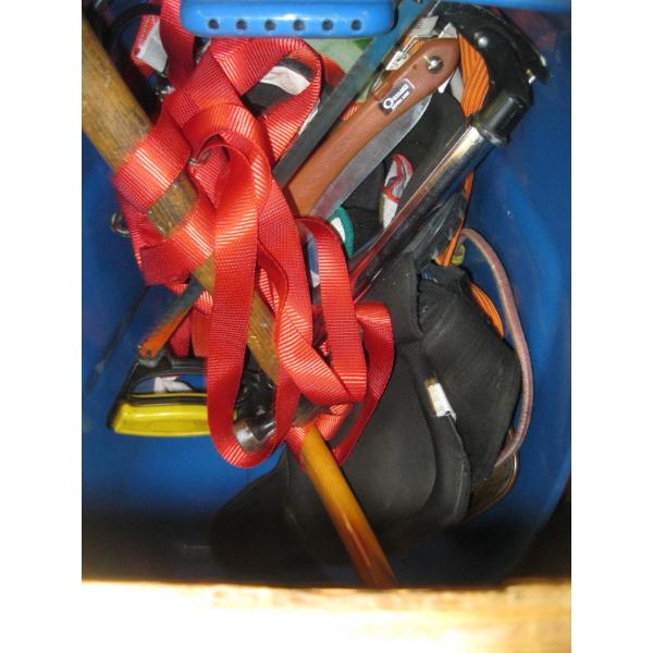 BIN OF MISC. KNEEPADS, TIEDOWN STRAPS, HATCHET, SAW, ETC.