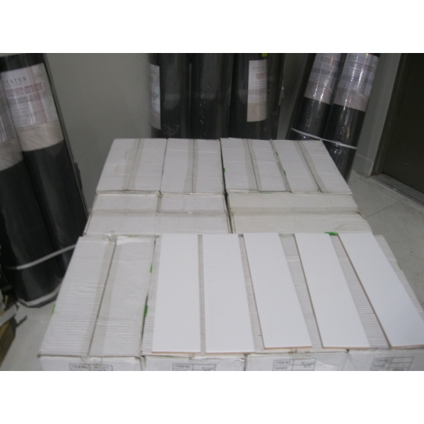 10 BOXES OF 4"X16" WHITE TILE