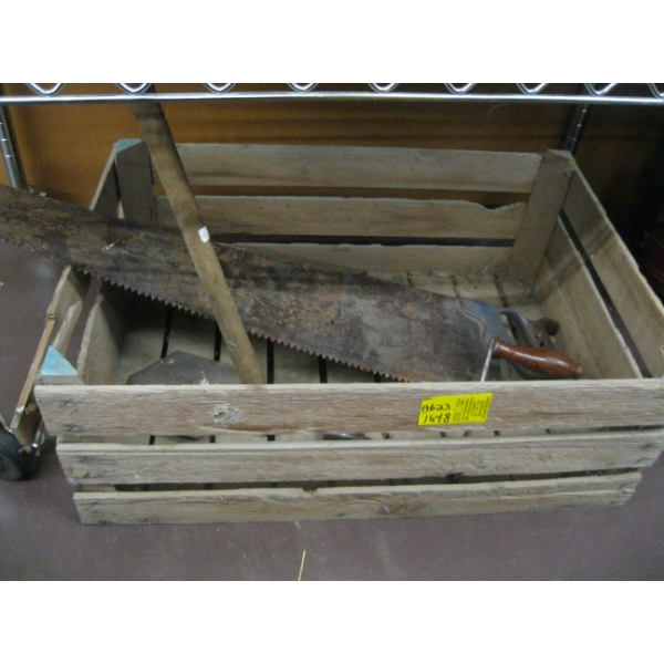 WOODEN CRATE W/METAL HANDLED SAW, CRANK HANDLE, ETC.