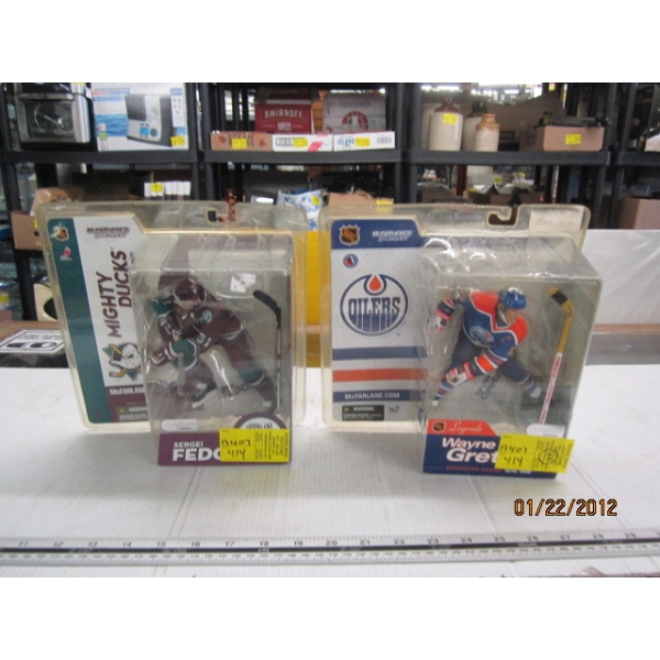 2 HOCKEY FIGURINES