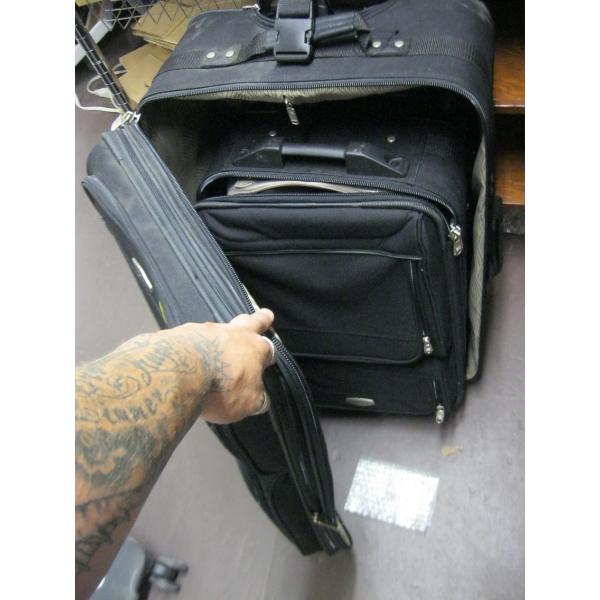 2 BLACK CARRY ON SUITCASES