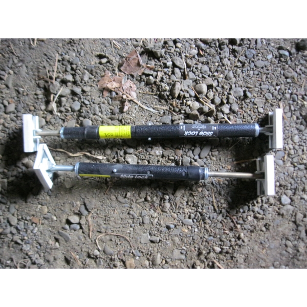 PAIR OF SLIDE LOCK BARS
