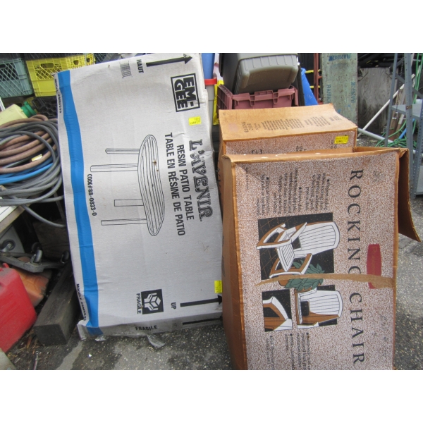NEW RESIN PATIO TABLE IN BOX & 2 PLASTIC ROCKING CHAIRS IN BOX