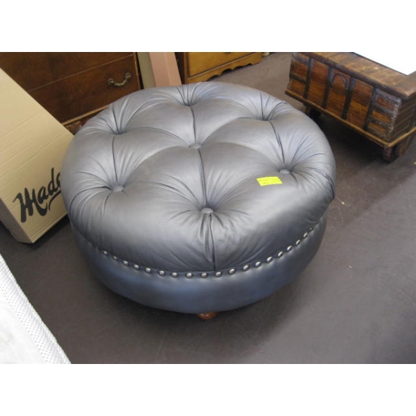 ROUND GREY LEATHER OTTOMAN