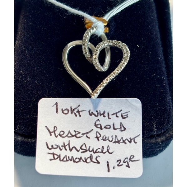 10KT WHITE GOLD HEART PENDANT W/SM. DIAMONDS