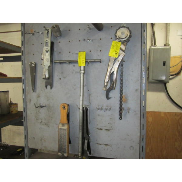 MISC. TOOLS ON END OF CABINET - VISE GRIP, CHAIN GRIPPER, ETC.