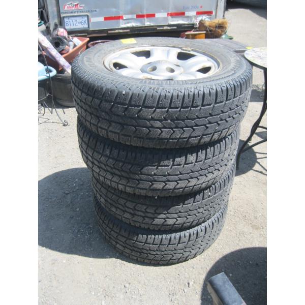 4 - 215/R7016 WINTER TIRES ON 5 BOLT TOYOTA RIMS