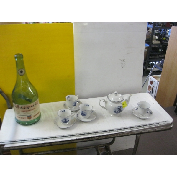 TEAPOT W/4 CUPS & SAUCERS & A LG. GLASS BOTTLE