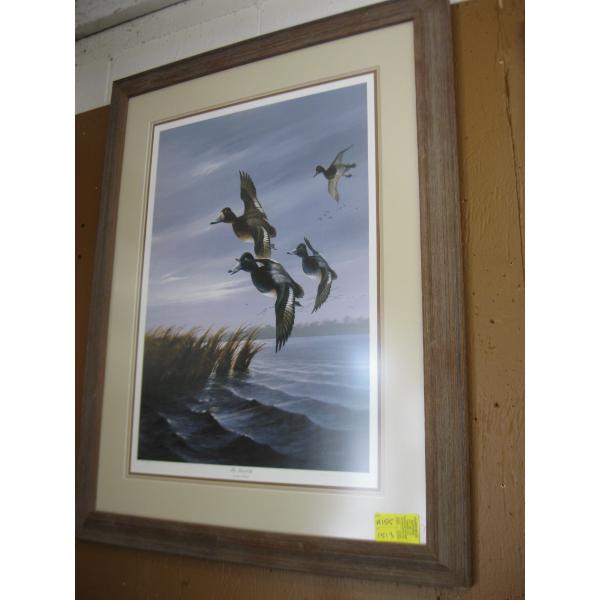 PICTURE OF GEESE FLYING OVER WATER