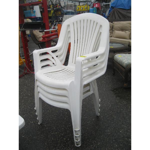 4 WHITE PLASTIC PATIO CHAIRS