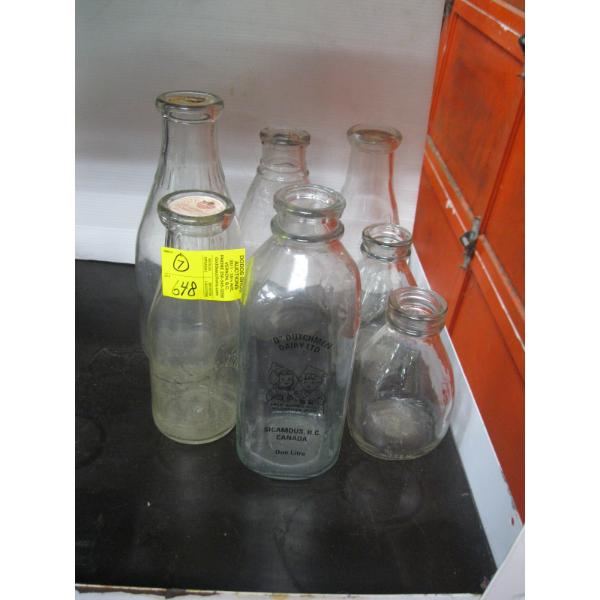 7 VARIOUS MILK BOTTLES