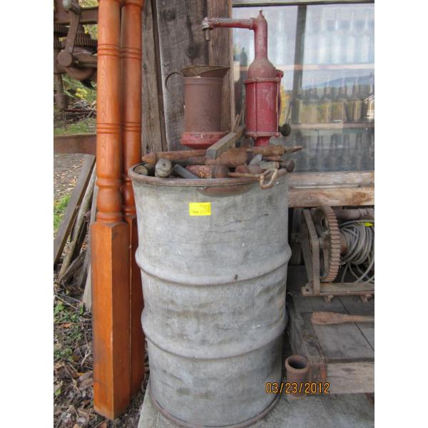 45 GALLON DRUM W/ASST. ITEMS - HAND PUMP, GREASE GUNS, ETC.