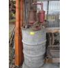 Image 1 : 45 GALLON DRUM W/ASST. ITEMS - HAND PUMP, GREASE GUNS, ETC.