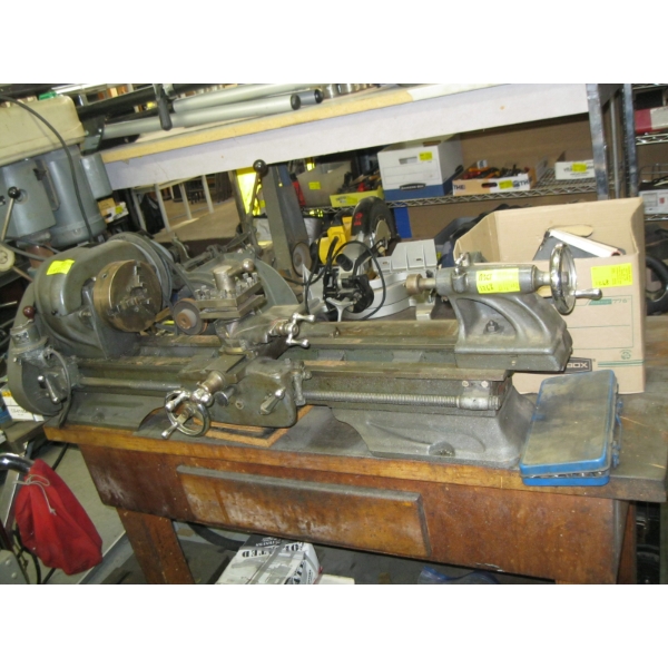 ELECTRIC METAL LATHE W/BOX OF ASST. ACCESS: STEADY REST, CHUCK, BENCH, ETC.
