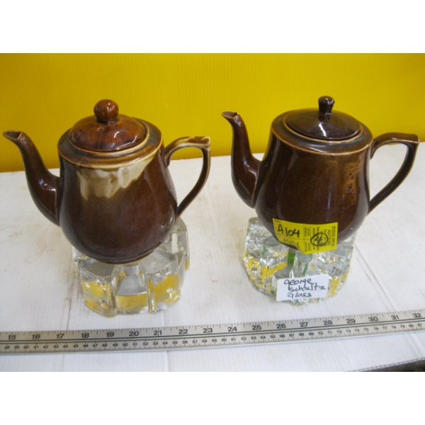 2 GEORGE SCHULTZ GLASS TEAPOT WARMERS W/2 TEAPOTS